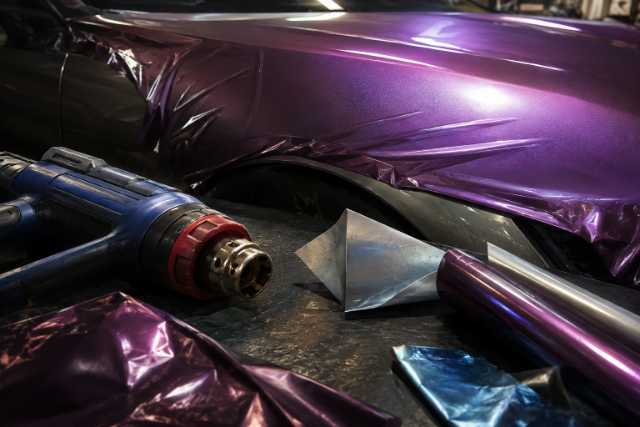 purple-vinyl-wrap-heat-gun-application
